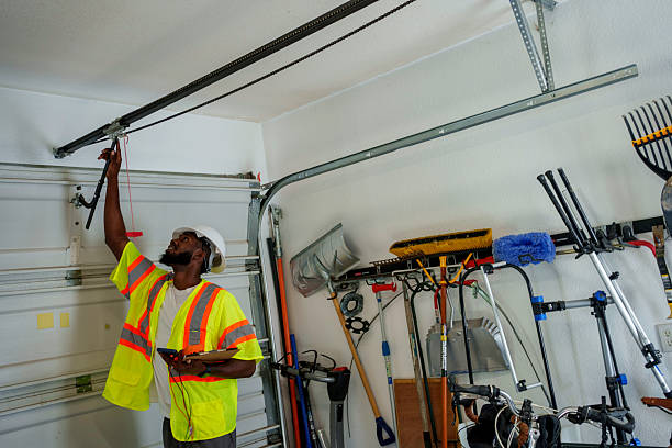 Professional Garage Door Maintenance technician working in North Westport, MA
